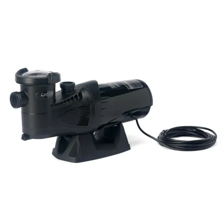 Angled front view of the Carvin Sharkwave above-ground pool pump showing the strainer housing, intake and outlet ports, ventilation grills, motor casing, power cord, and mounting base