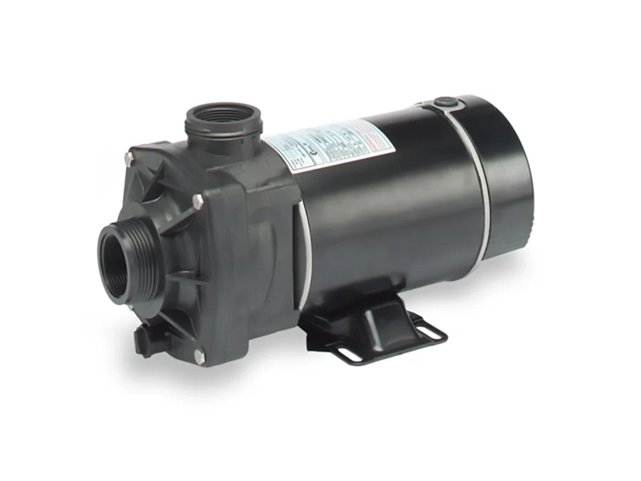 Angled front view of the Carvin Stingray above-ground pool pump showing the threaded inlet port, reinforced housing, motor casing, and mounting base