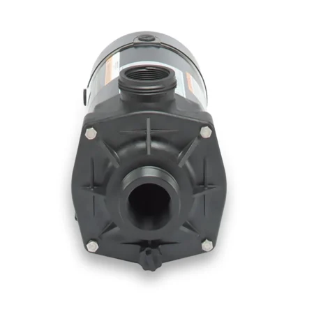 Front view of the Carvin Stingray above-ground pool pump showing the central threaded inlet port, reinforced housing, mounting bolts, and durable pump casing